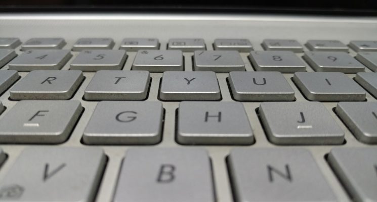 silver laptop keyboard